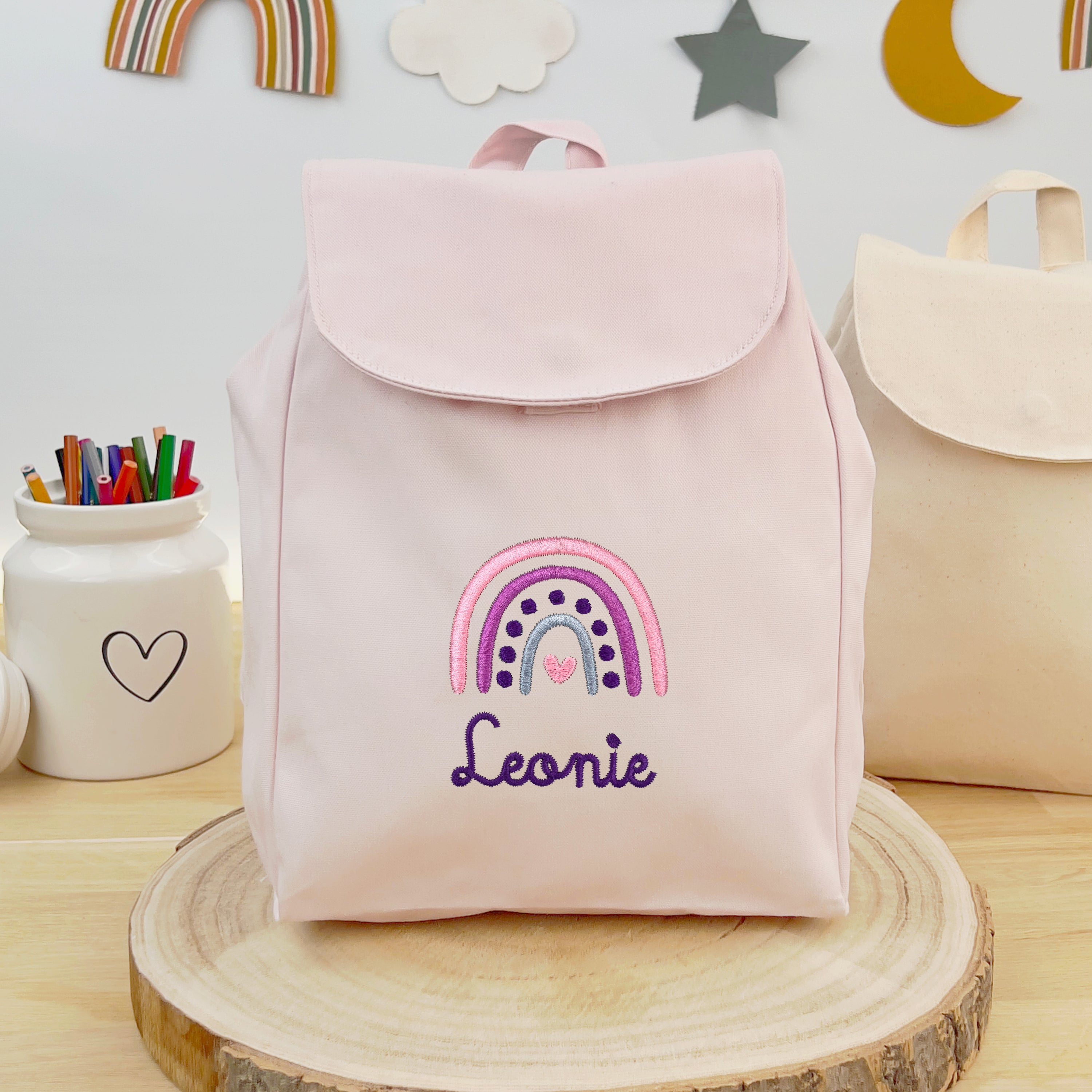 Bio Kinderrucksack mit Namen und Regenbogen - Rosa/Lila