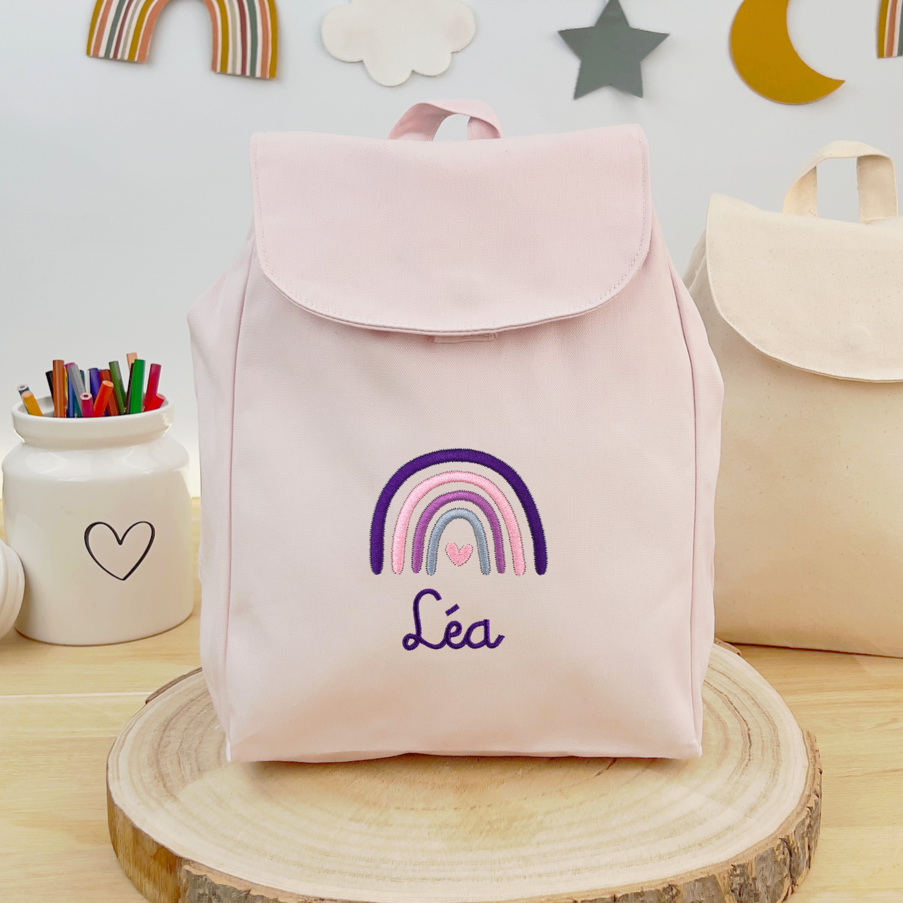 Bio Kinderrucksack mit Namen und Regenbogen - Rosa/Lila